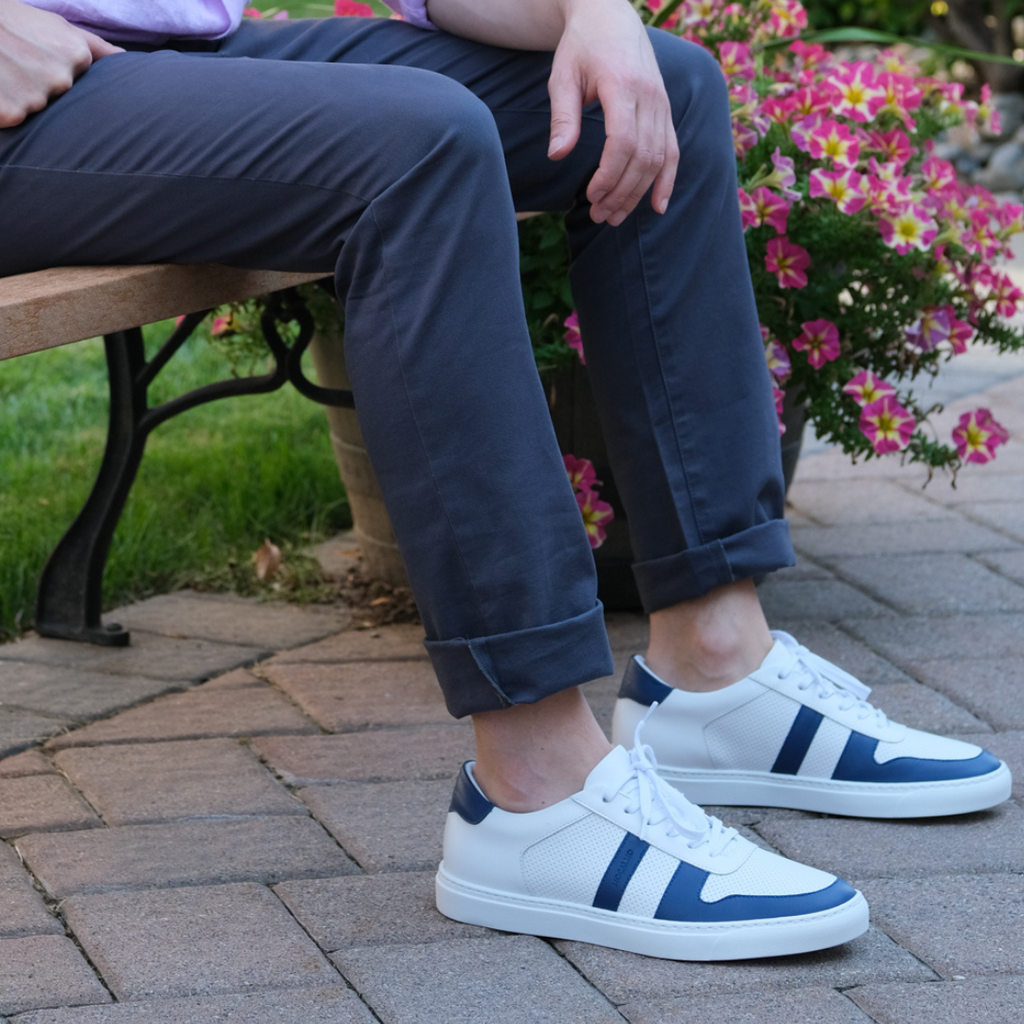 Man wearing stylish blue sneakers with nice chinos
