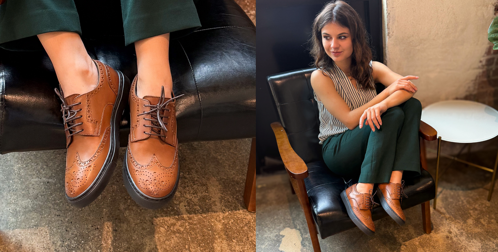 Woman wearing brown cognac leather wingtip dress sneakers made in italy