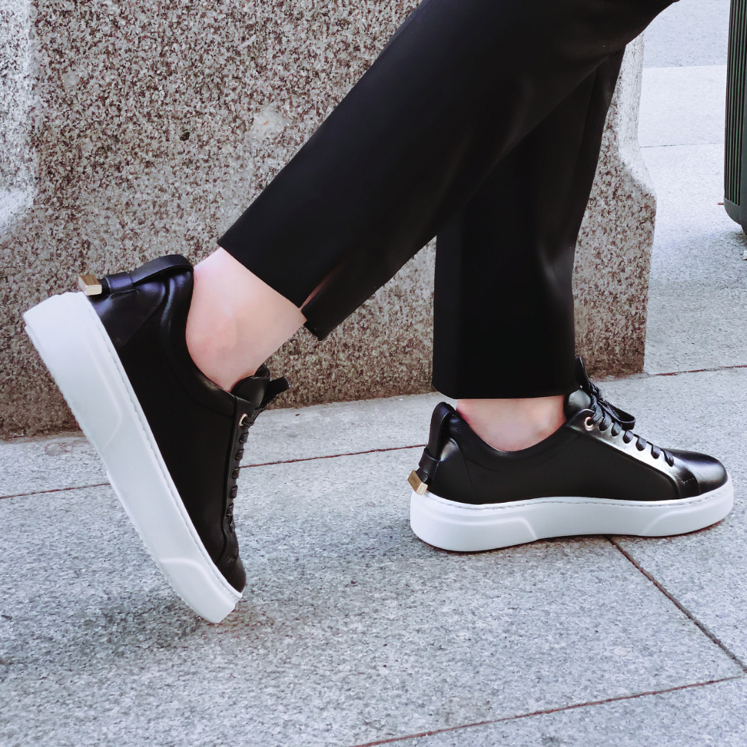 Autry Women's Medalist Mid Sneakers in White/Black Autry