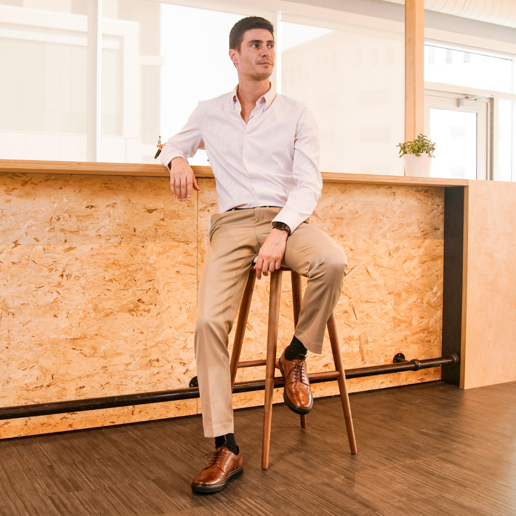 Man Sitting Comfortably Wearing Sneakers