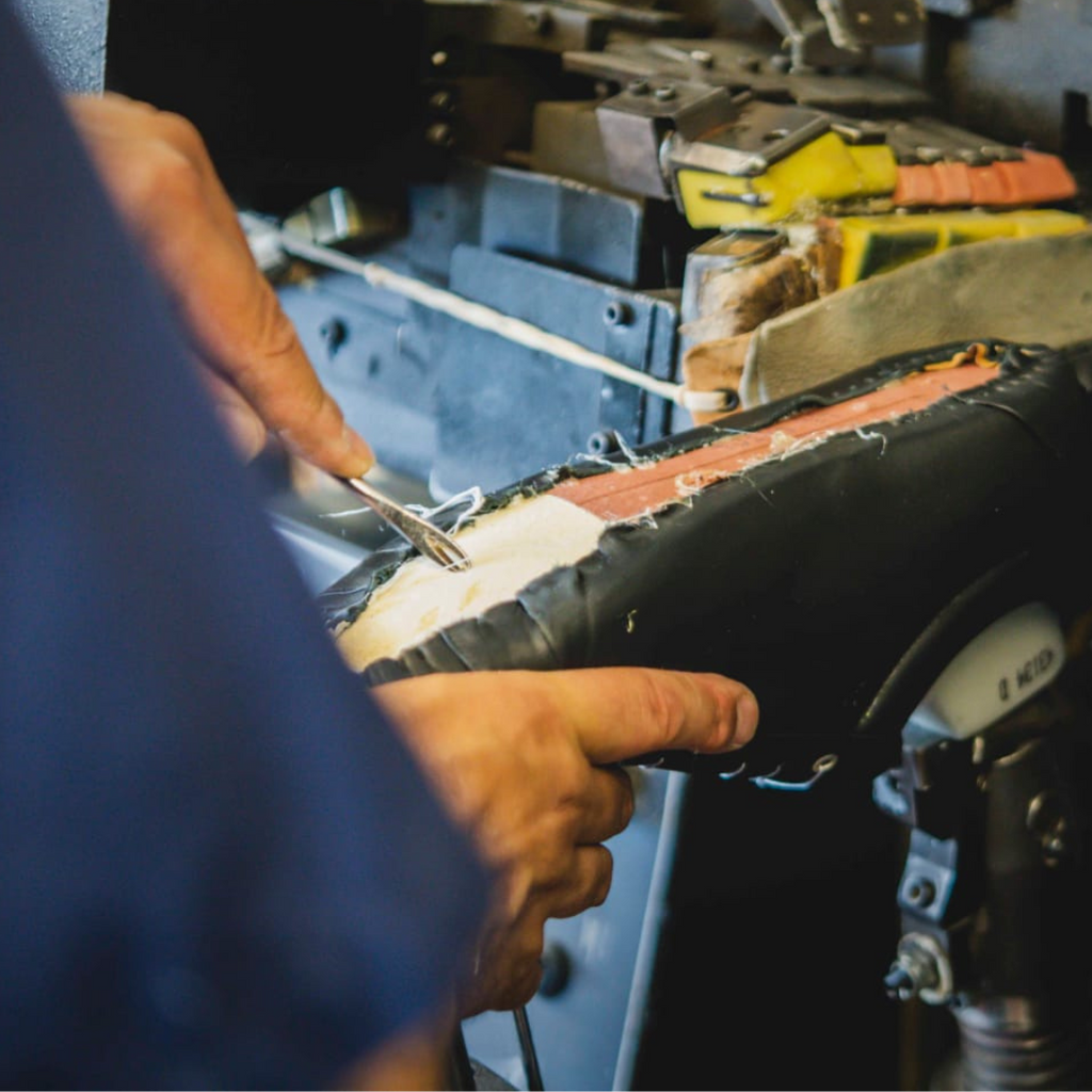 Artisan in Italy making black stylish leather sneakers