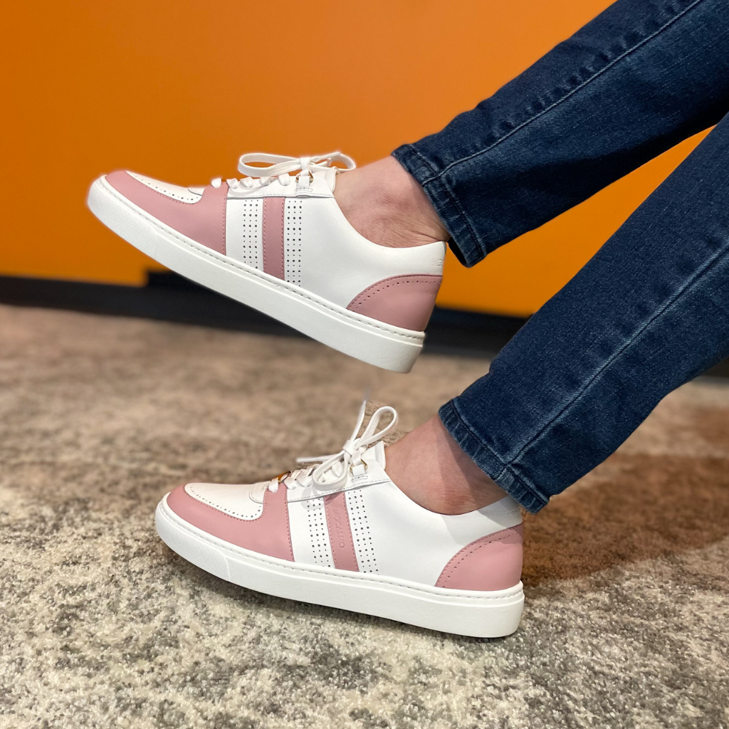 Woman wearing pink sneakers