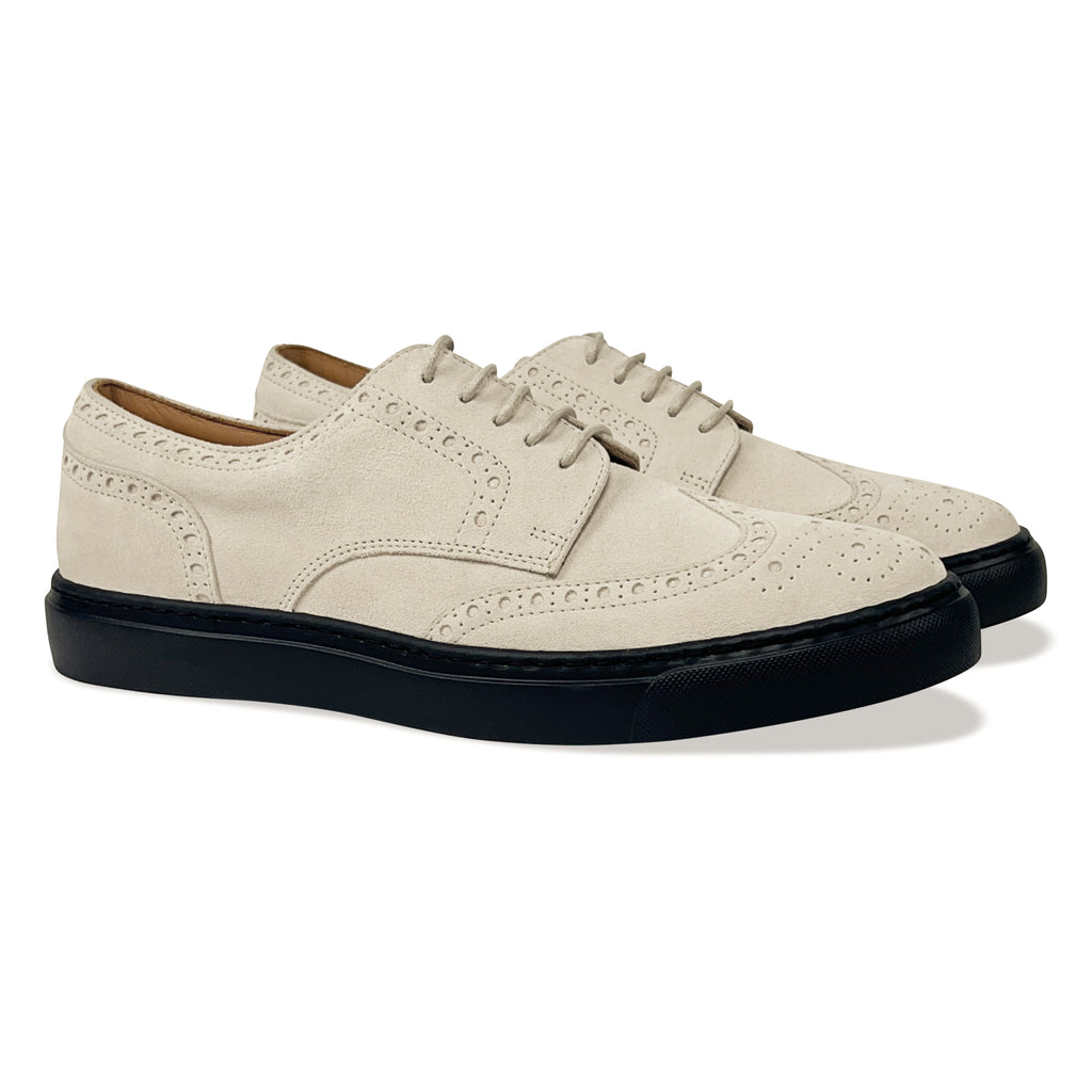 Women's Aida Ivory Wingtip Sneaker_Diagonal View