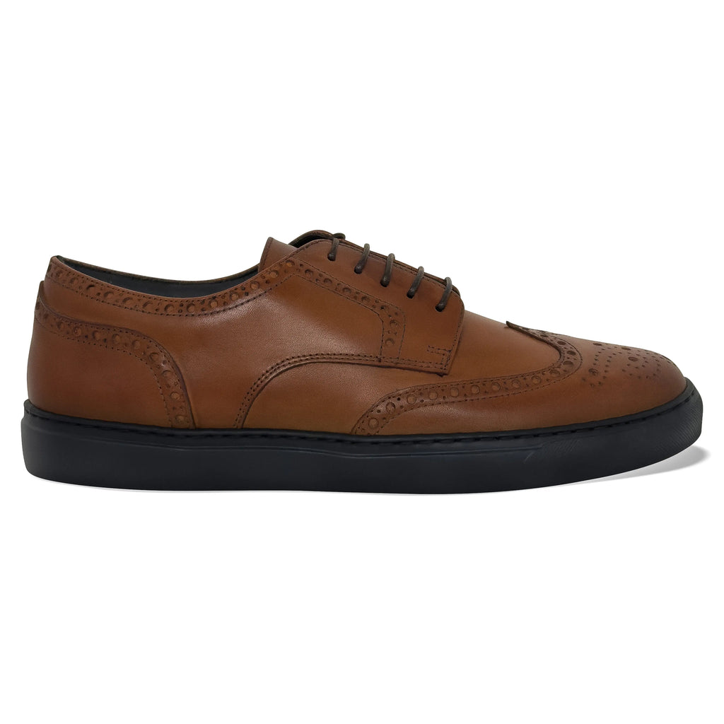 Women's cognac brogue wingtip dress sneaker - side view