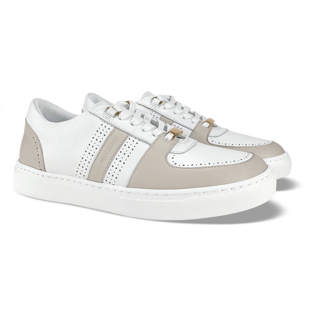 Women's stylish ivory gray white sneakers - angled view